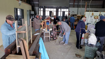 Shed members working together in the workshop